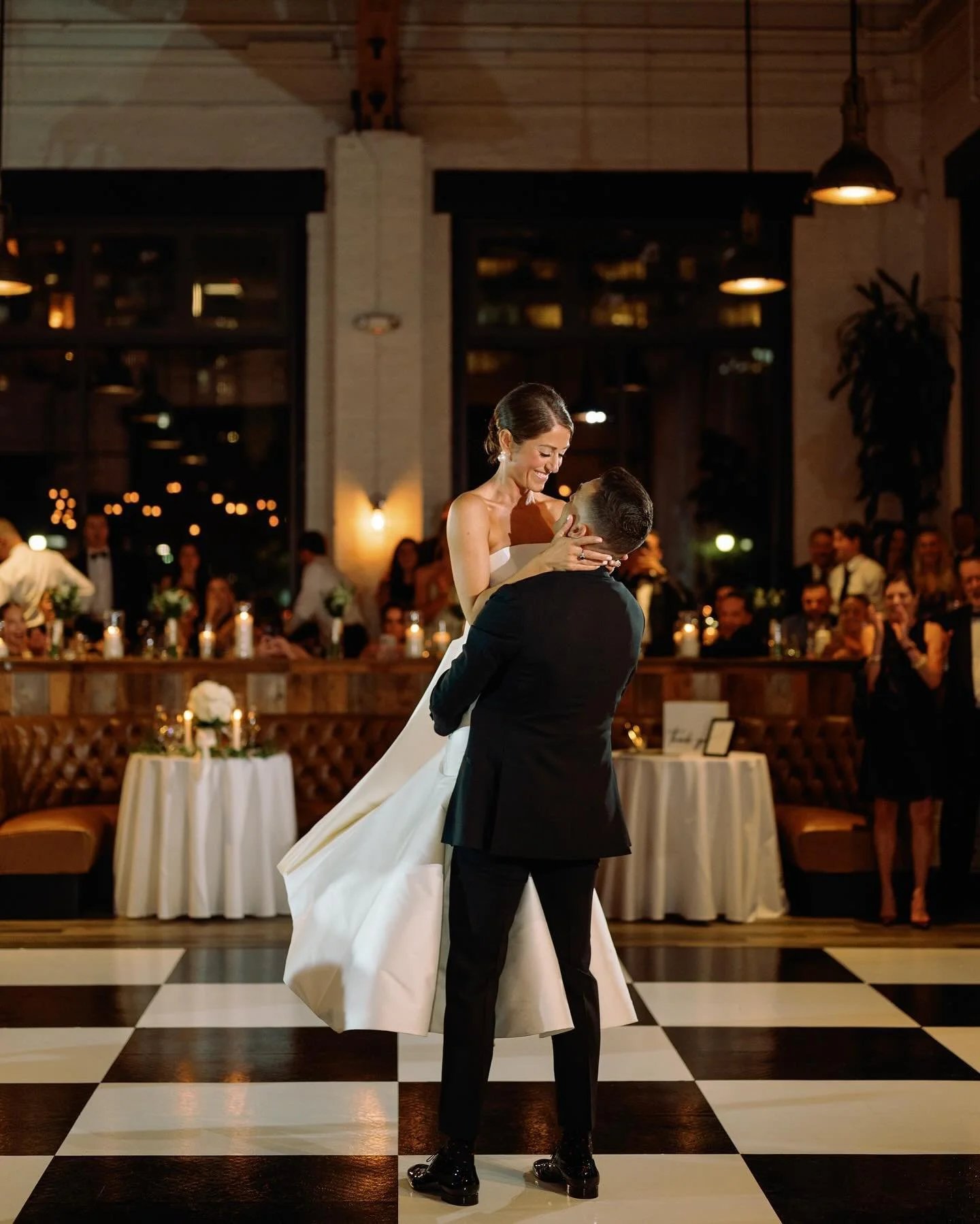 All white dance floor set up at an outdoor garden wedding reception near New Orleans